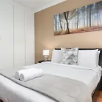 Modern & Secure Home, Walking Distance To Beach!